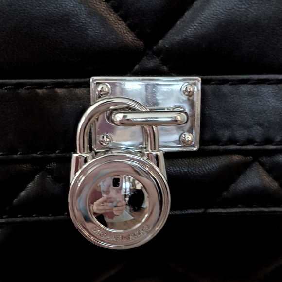 Michael Kors Quilted Black purse Perfect condition. Comes with a dust bag too! - Picture 3 of 7